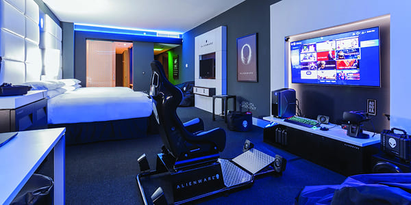 Hotel room with gaming desk setup